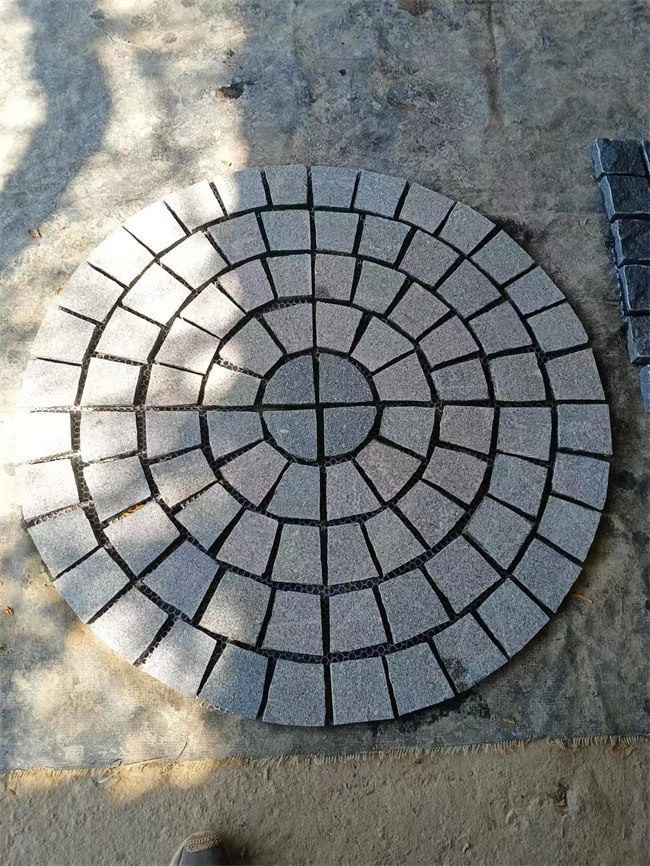 Round stone pavers on mesh Round stone pavers on mesh